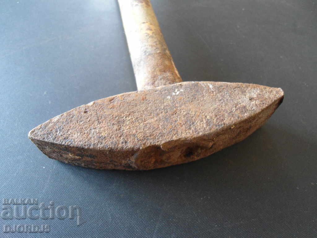 Auction  Old hammer, iron handle