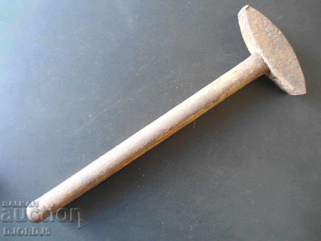 Old hammer, iron handle