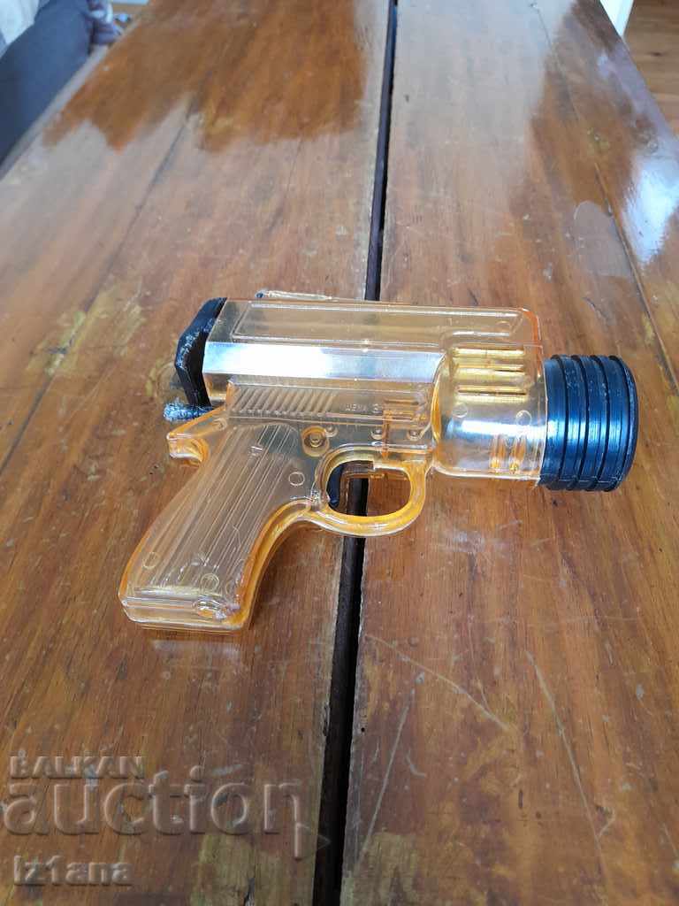 Old children's pistol with bullets
