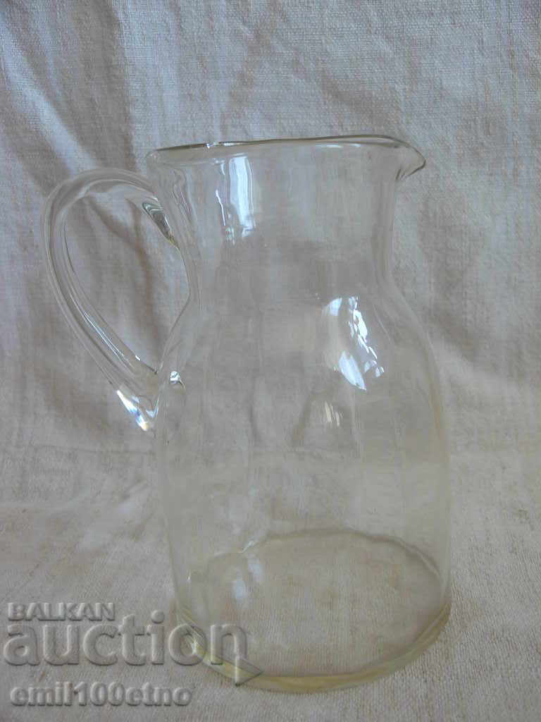 A small glass jug