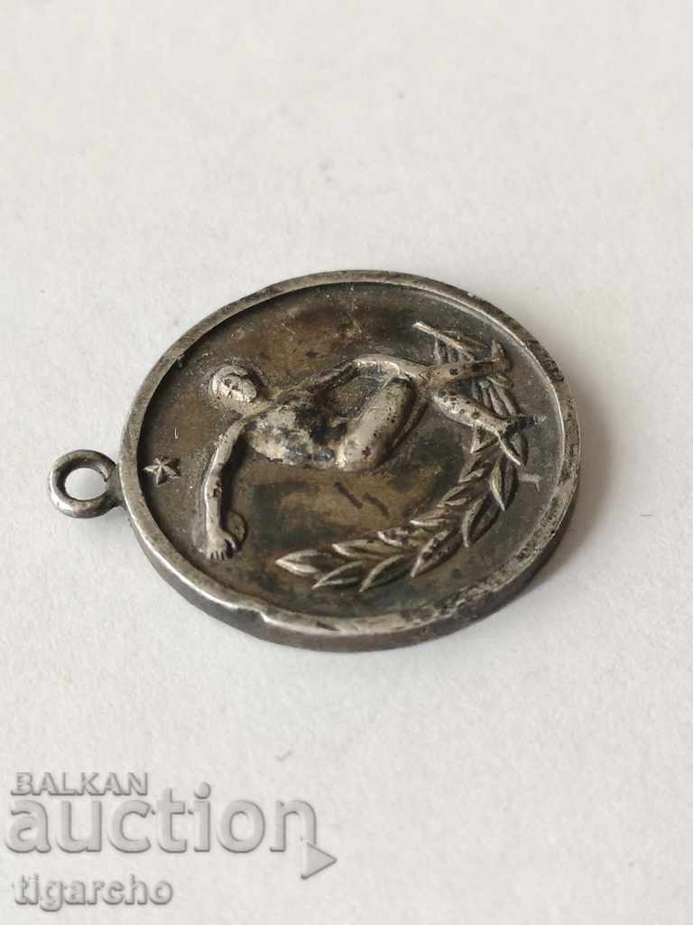 Delivery of Silver medal