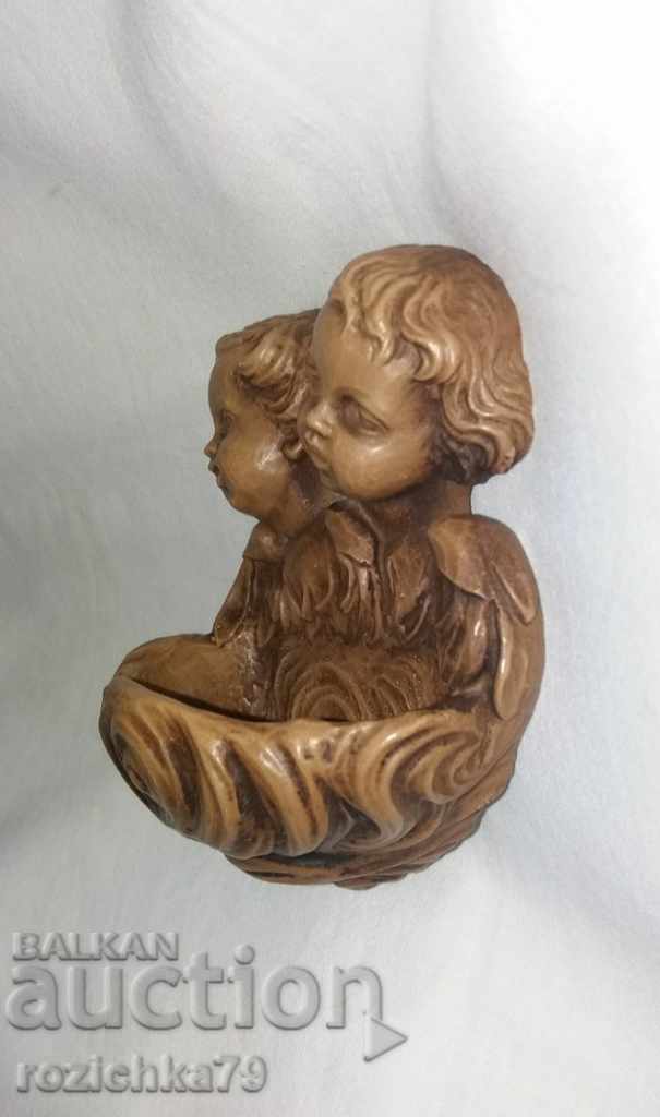 Livrarea Figurina de perete din plastic Livrarea Figurina de perete din plastic