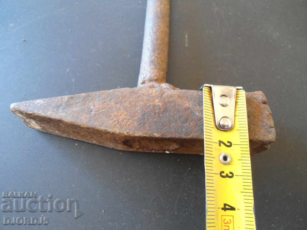 Auction  Old hammer, iron handle