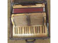 OLD ACCORDION WITH SUITCASE