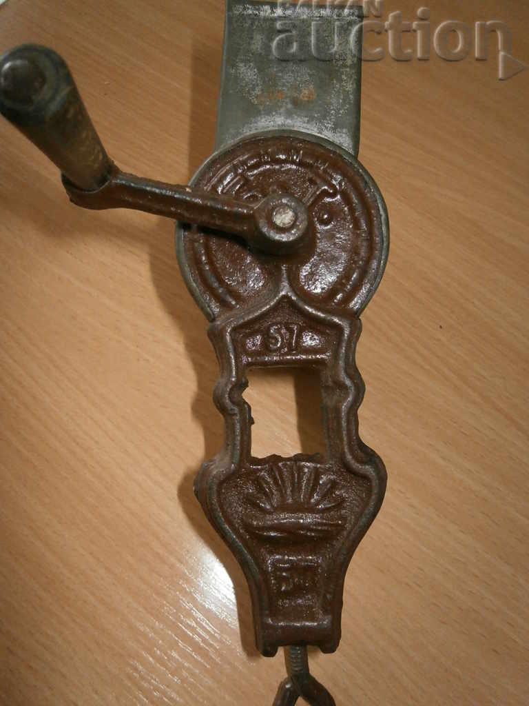 Delivery of retro cast iron mill grinder for walnuts vintage Delivery of retro cast iron mill grinder for walnuts vintage