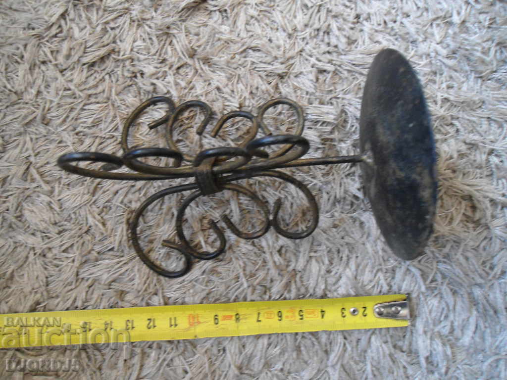 Delivery of An old metal candleholder Delivery of An old metal candleholder