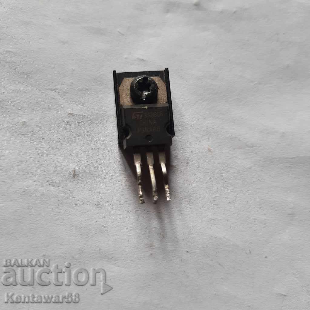 MOS transistor P3NA60 mounted on a heatsink.