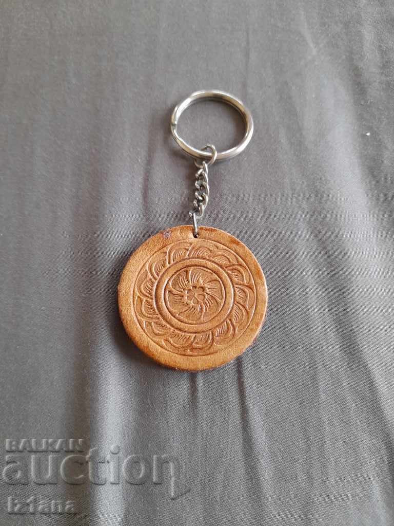 Auction An old leather keychain Auction An old leather keychain