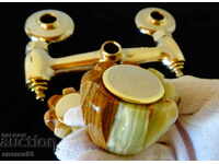 Italian brass faucet with onyx.