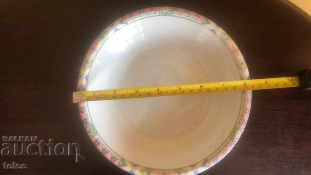 Auction Set of 4 porcelain deep plates with markings Auction Set of 4 porcelain deep plates with markings