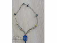 Necklace with African motifs in grunge style-7