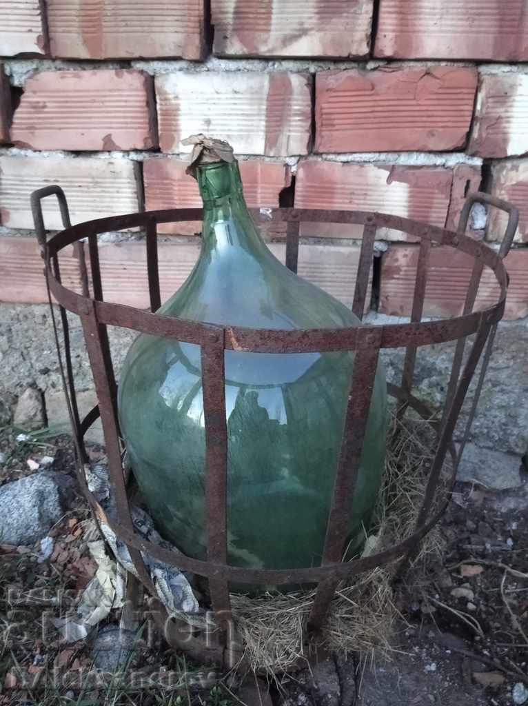 Large glass jar with a metal basket