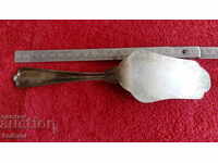 Old metal silver-plated kitchen utensil spatula spatula