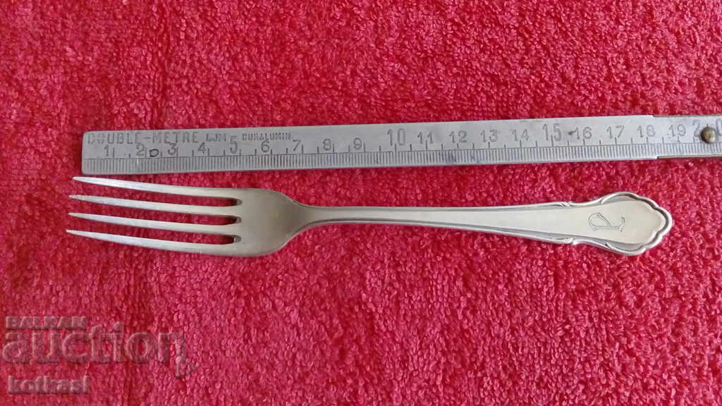 Old silver plated fork kitchen utensil