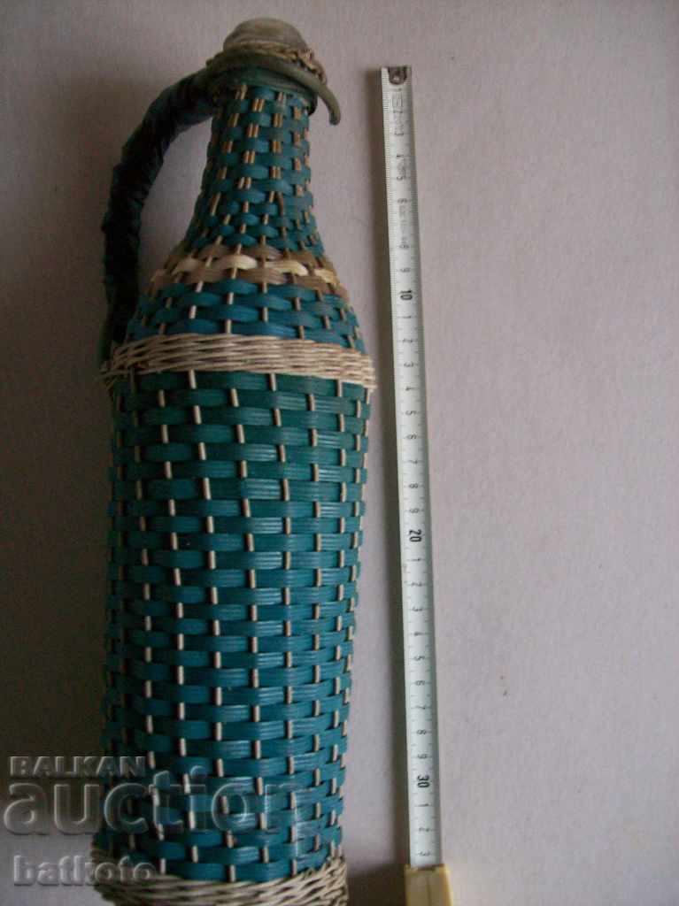 A small damajanka, a bottle with a braid