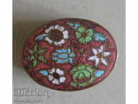 Old brass box with enamel decoration