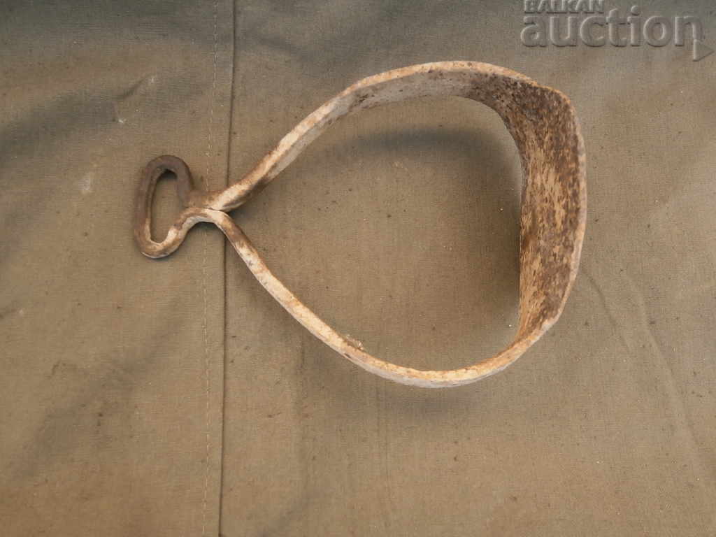 Auction  an ancient wrought primitive stirrup