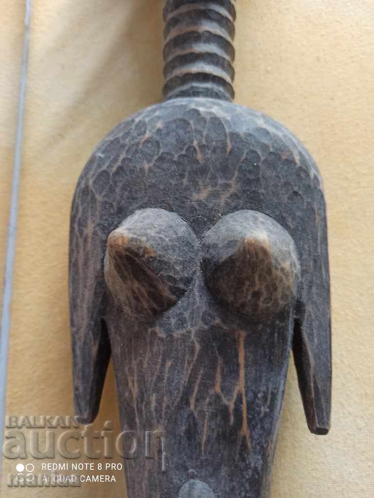 Auction Tall wooden figurine Auction Tall wooden figurine