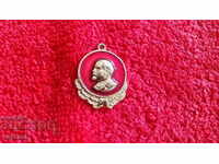 Old social badge Lenin