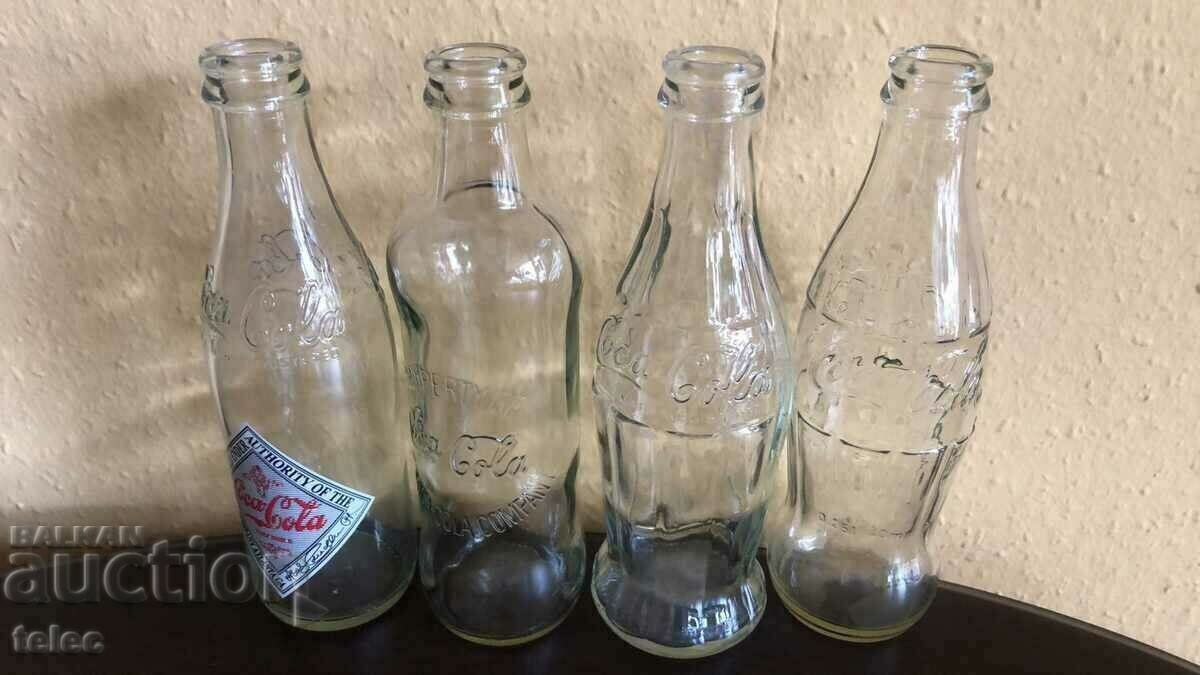 Set of 4 collectible Coca Cola bottles - Reduced