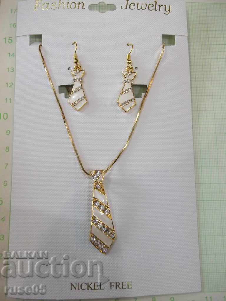 Set of chain, pendant and earrings imitation jewelry