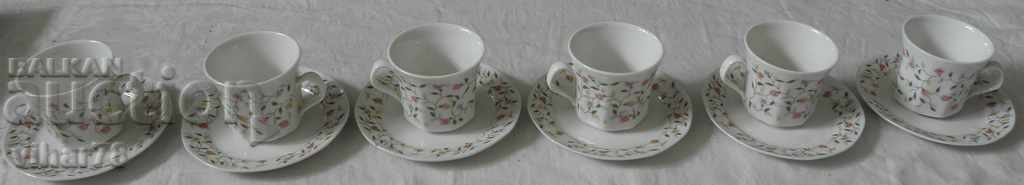 Auction porcelain cups 6 pcs service Auction porcelain cups 6 pcs service