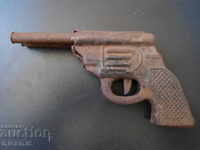Old metal pistol, toy