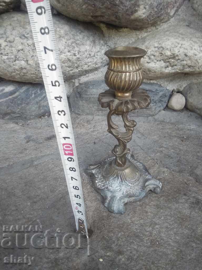 Old bronze candlestick with price 25.00 BGN | € 12.78 Old bronze candlestick with price 25.00 BGN | € 12.78