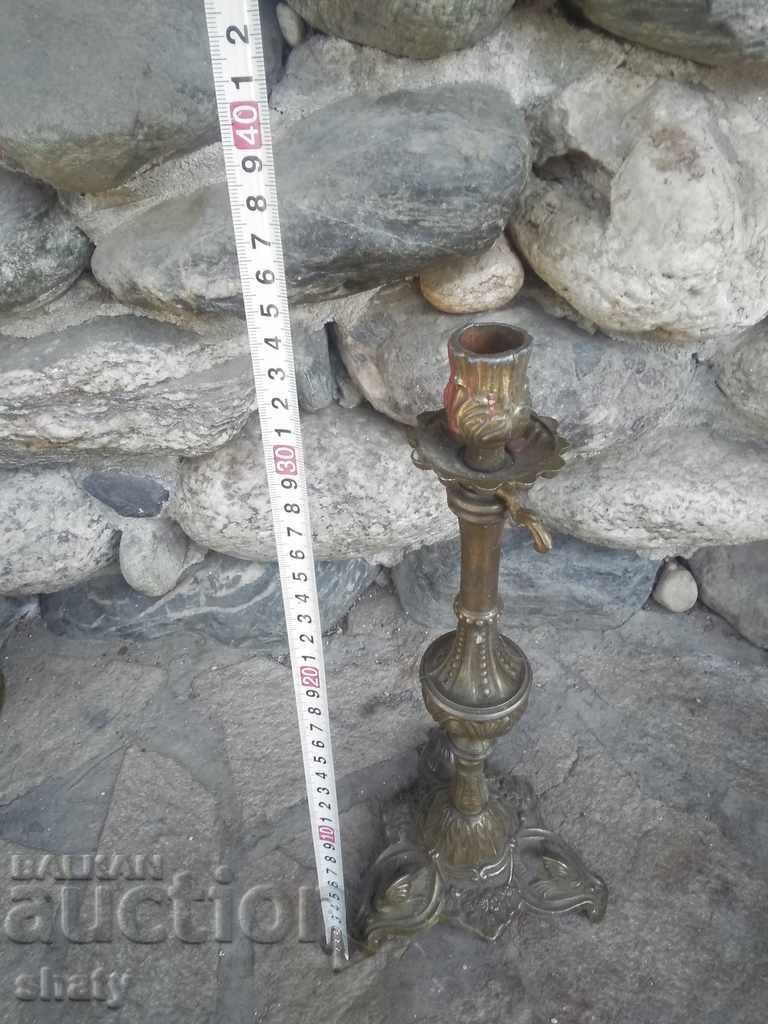 Old bronze candlestick with price 35.00 BGN | € 17.90 Old bronze candlestick with price 35.00 BGN | € 17.90