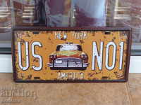 Metal number plate taxi New York America taxi stand
