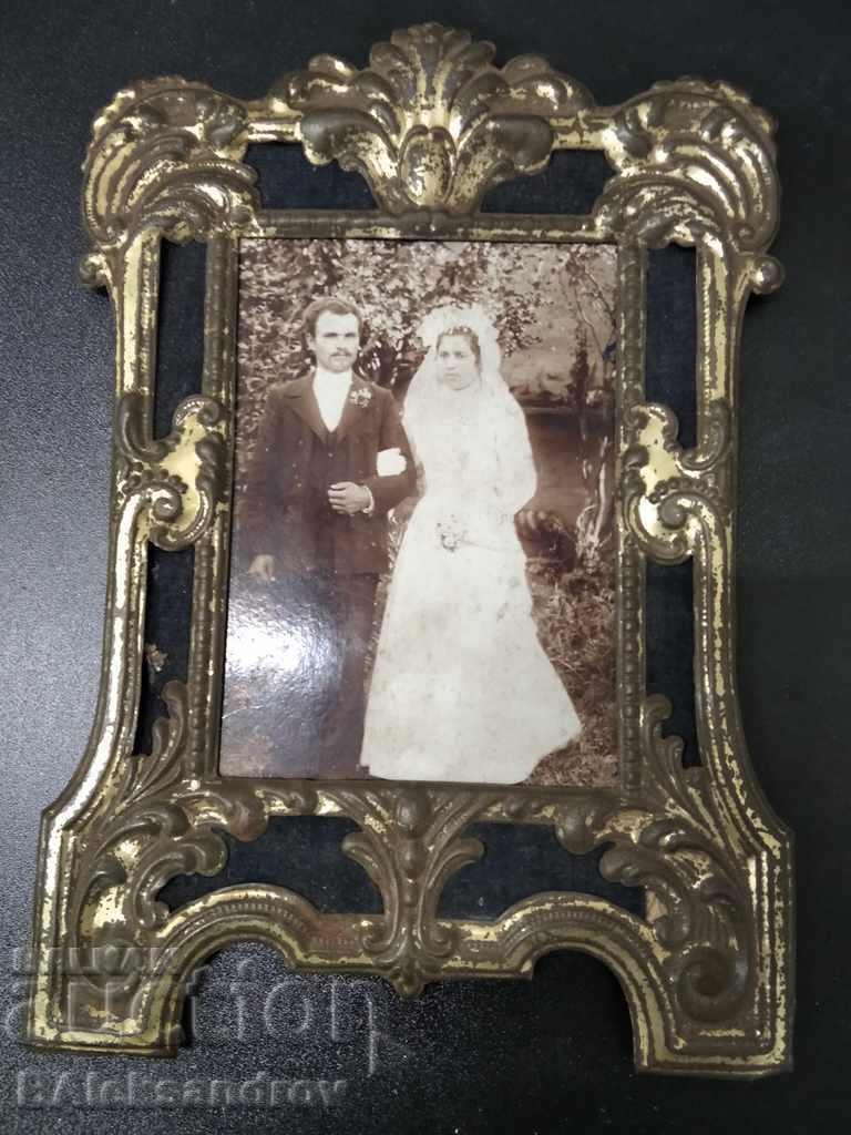 Old family photo with metal frame