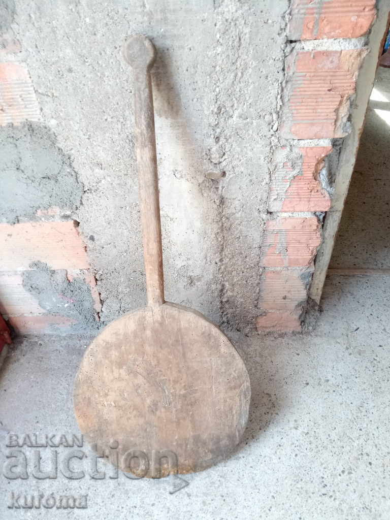 Old bread cutting board shovel for bread