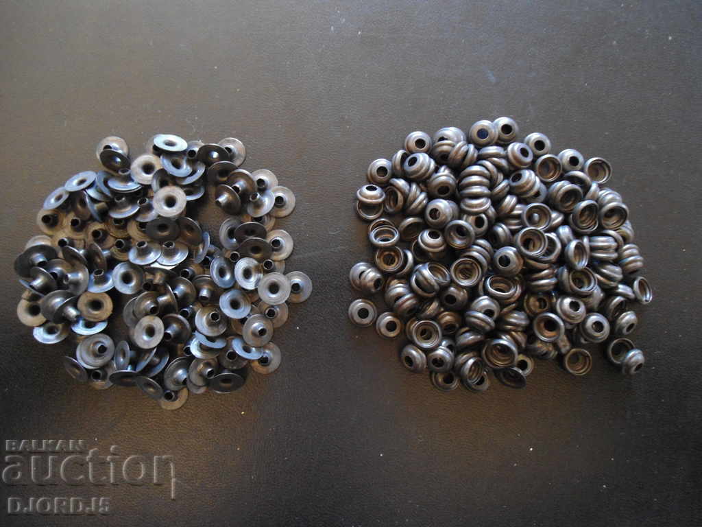 Lot of metal eyelets, buttons