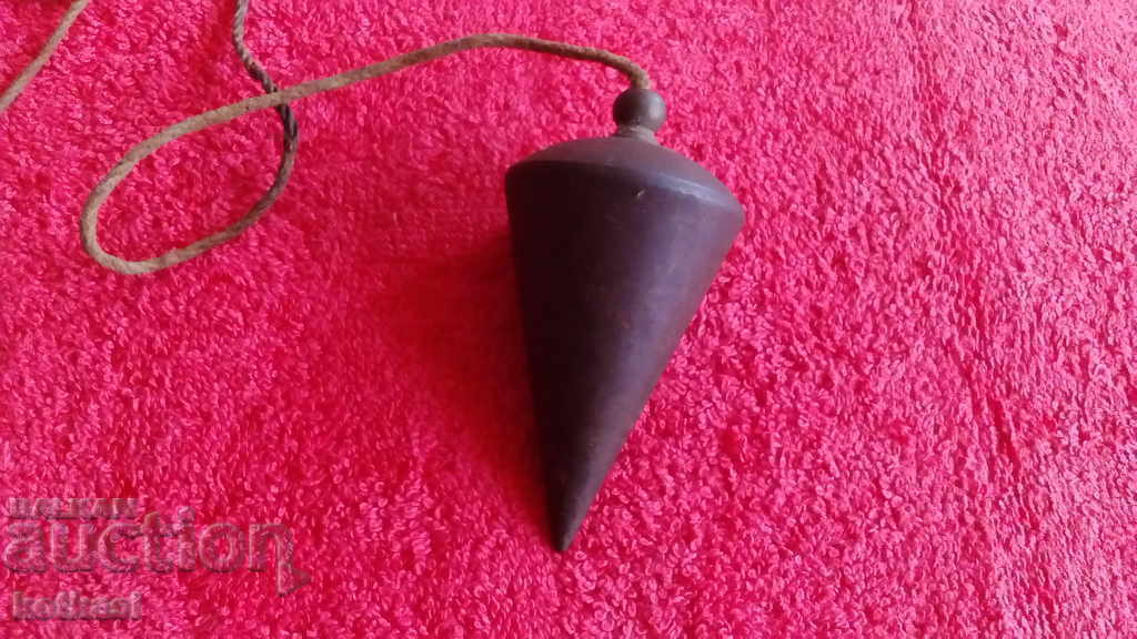 Old metal iron plumb line Old metal iron plumb line