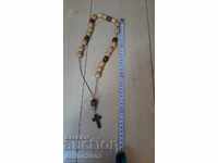 Wooden rosary with a cross