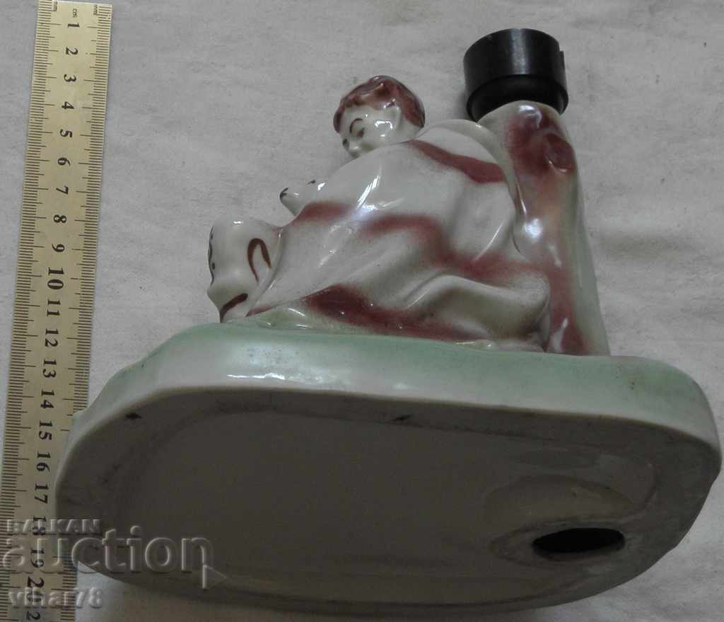 Auction An old porcelain lamp Auction An old porcelain lamp