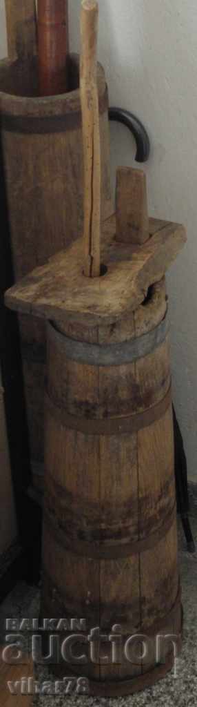 an old wooden oil bucket