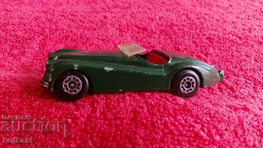 Delivery of MATCHBOX INTL LTD ENGLAND JAGUAR XK 120 old metal car