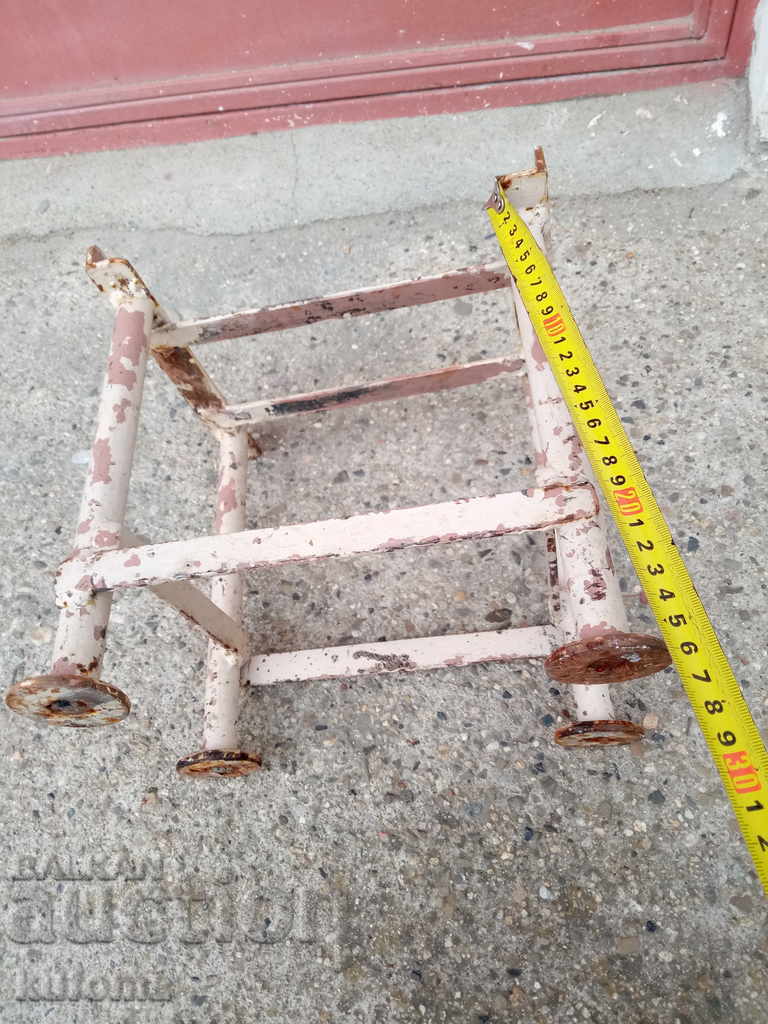 Auction  Old iron stand