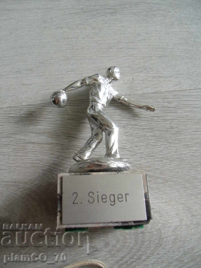 Auction  № * 5325 old metal prize statuette