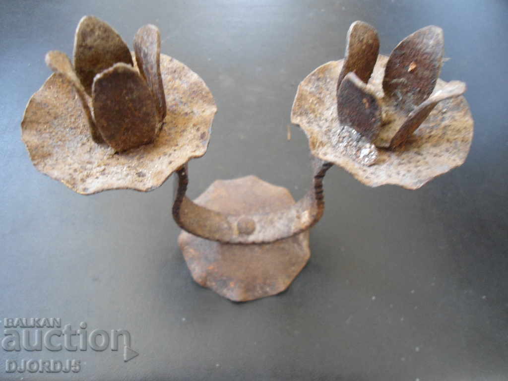 An old forged candlestick with price 5.00 BGN | € 2.56 An old forged candlestick with price 5.00 BGN | € 2.56