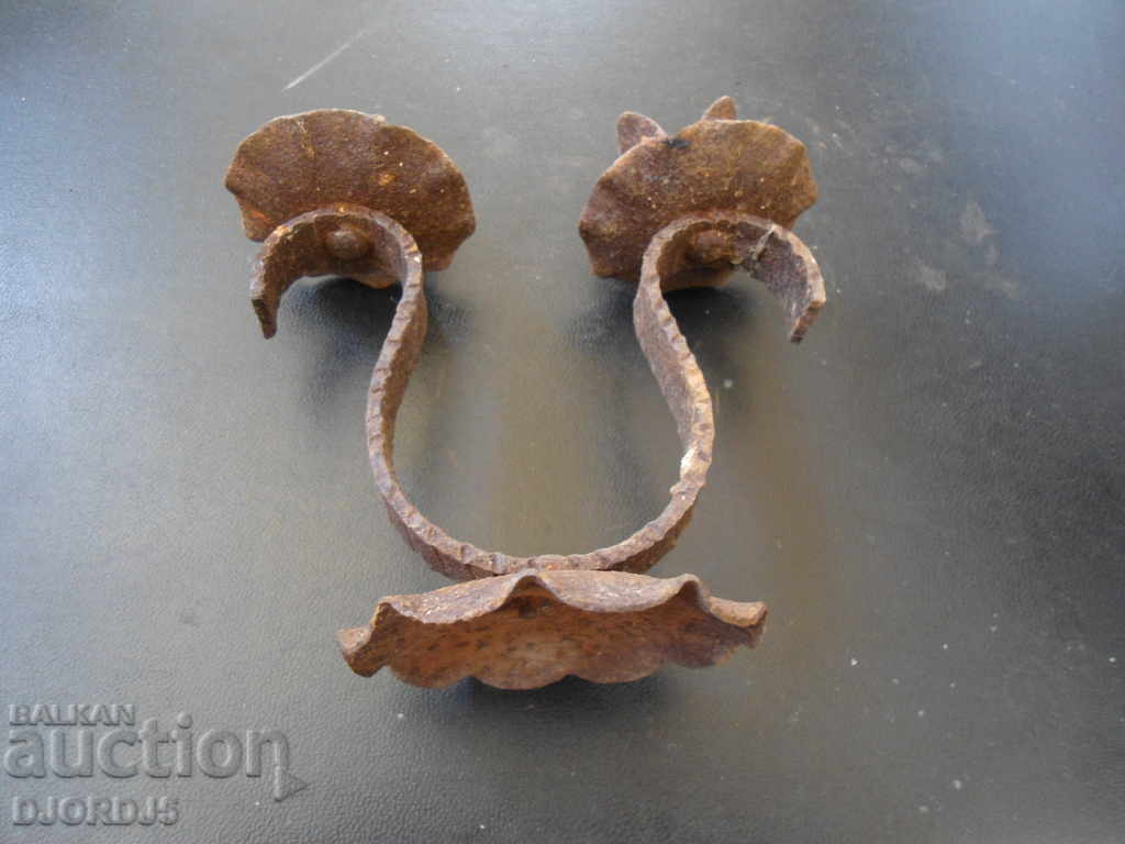 Auction An old forged candlestick Auction An old forged candlestick