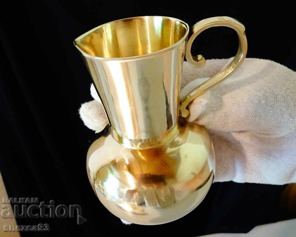 Bronze jug for brandy, milk.