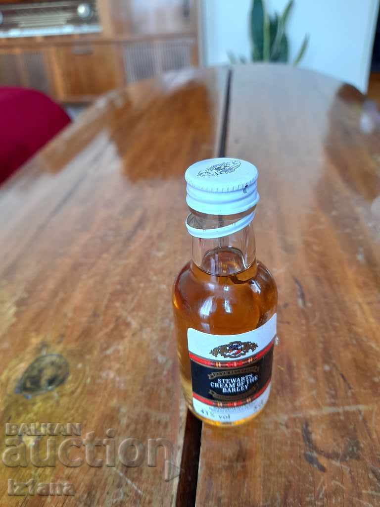 Auction Old bottle of Stewarts Cream of the Barley Auction Old bottle of Stewarts Cream of the Barley