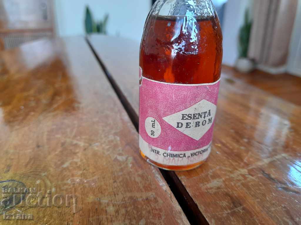 Old bottle of rum essence with price 20.00 BGN | € 10.23