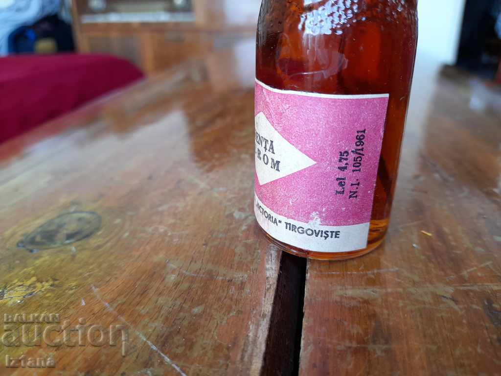 Delivery of Old bottle of rum essence