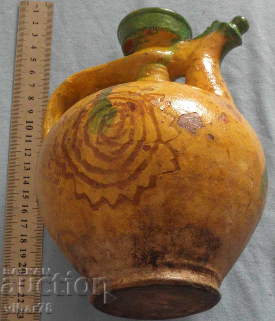 Auction  Ancient clay cronder