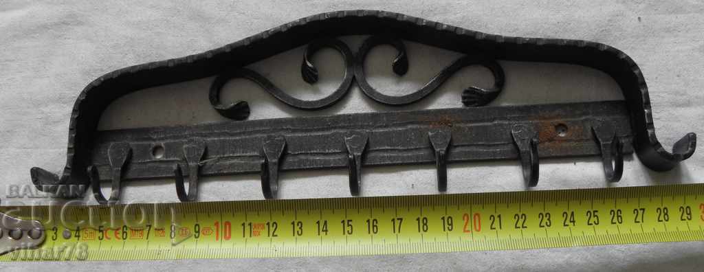 Auction Wrought iron hanger Auction Wrought iron hanger