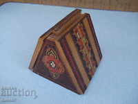 Triangular wooden cigarette case pyrographed from the sauce