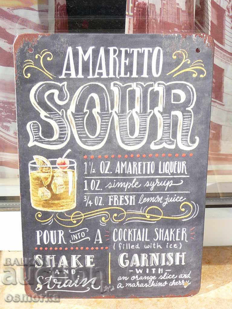 Metal plate cocktail Amaretto Sour liqueur syrup fresh lemon